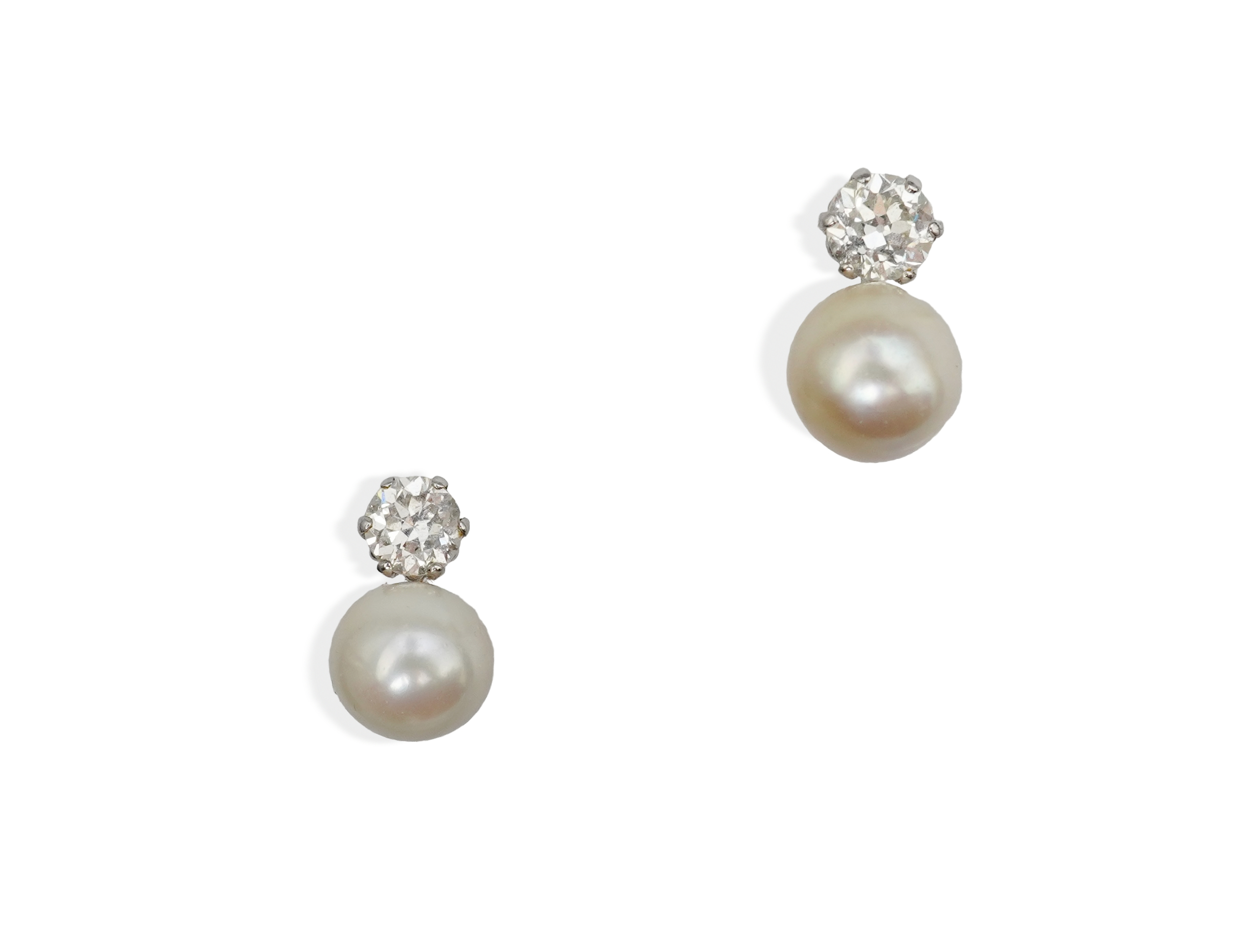 A pair of pearl and diamond ear clips, mid 20th century